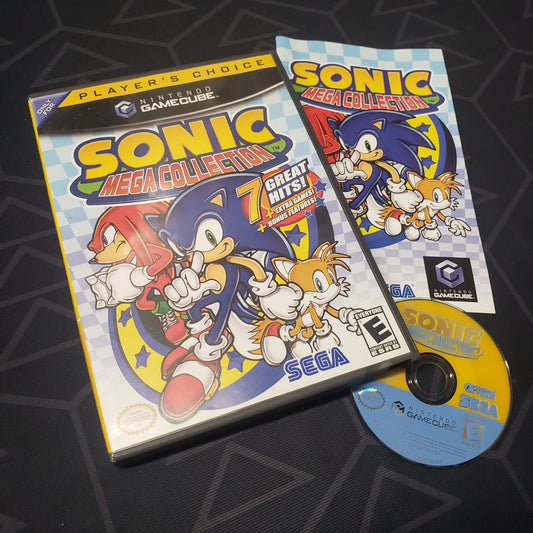 Image shows the case, manual and disc for the video game Sonic Mega Collection for Nintendo GameCube
