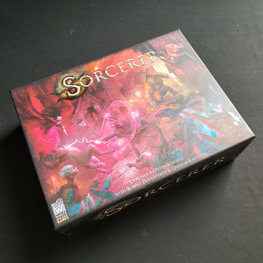 Image shows the front cover of the box of the Sorcerer card game