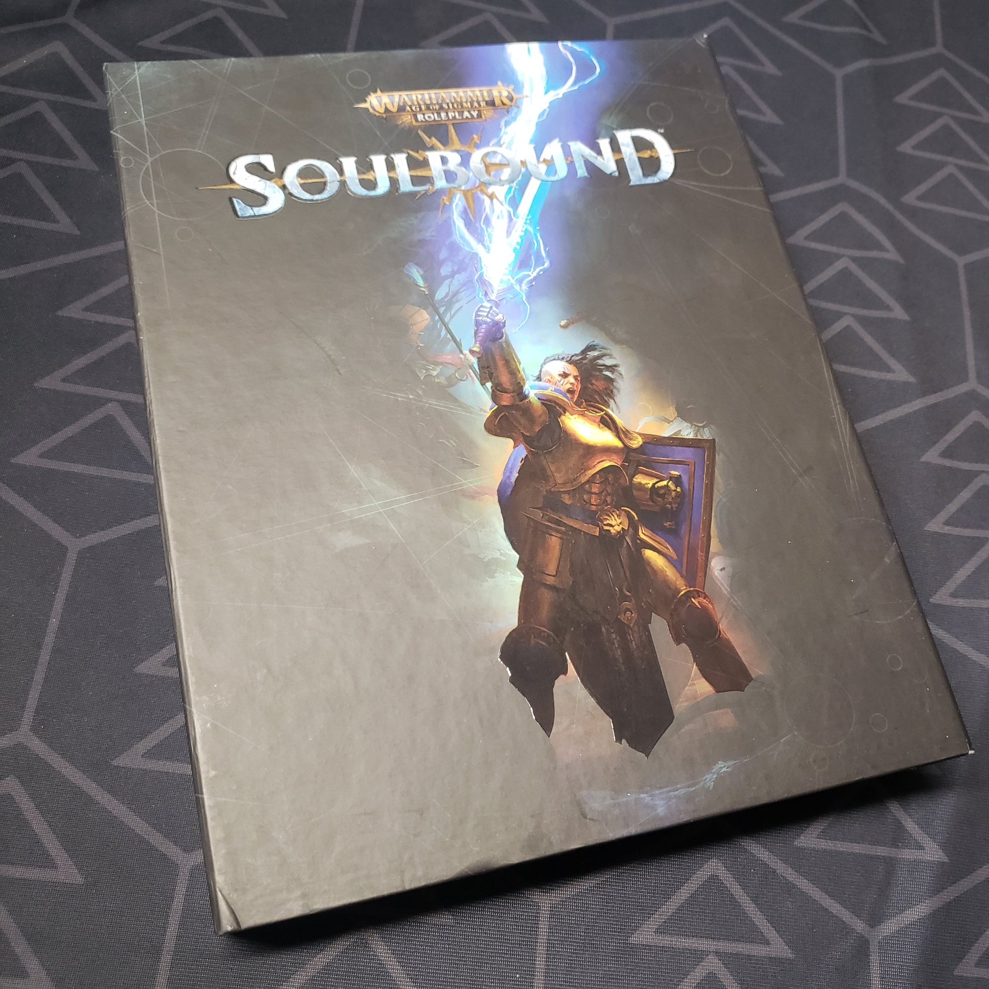 Image shows the front cover of the Collector's Edition core rulebook box for the roleplaying game Soulbound