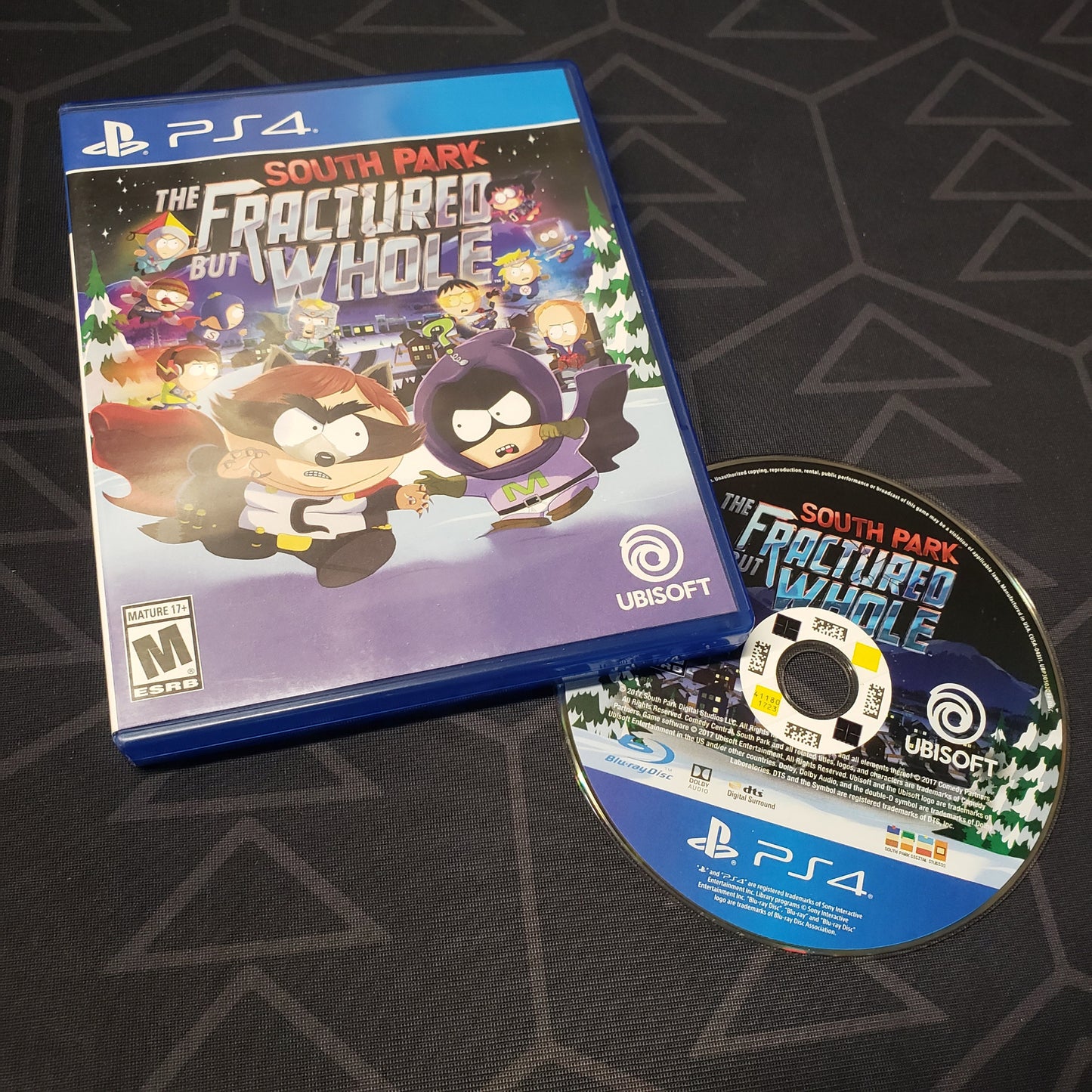 Image shows the case and disc for the video game South Park: The Fractured but Whole for Playstation 4