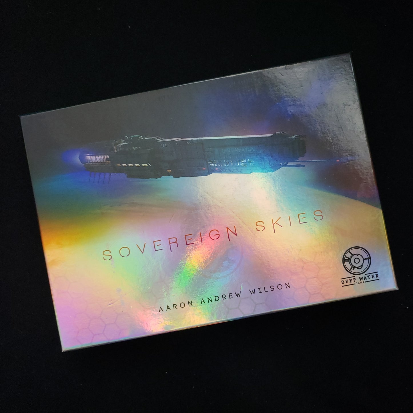 Image shows the front cover of the box of the Sovereign Skies board game