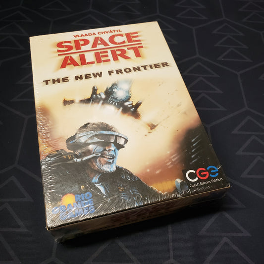 Image shows the front cover of the box of the New Frontier expansion for the board game Space Alert