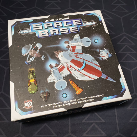 Image shows the front cover of the box for the Space Base board game