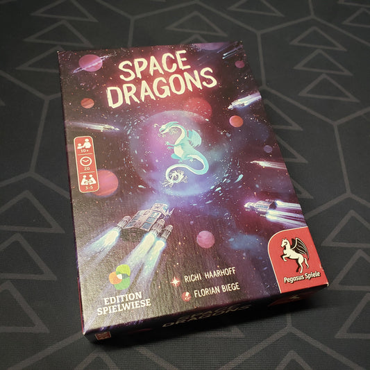 Image shows the front cover of the box for the Space Dragons card game