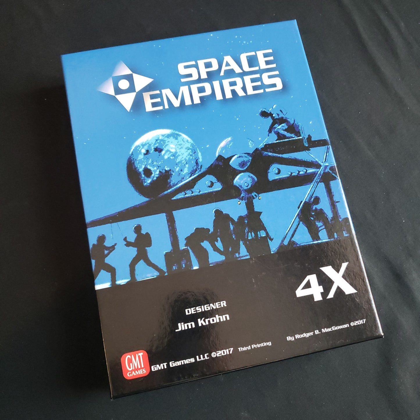 Image shows the front cover of the box of the Space Empires 4X board game