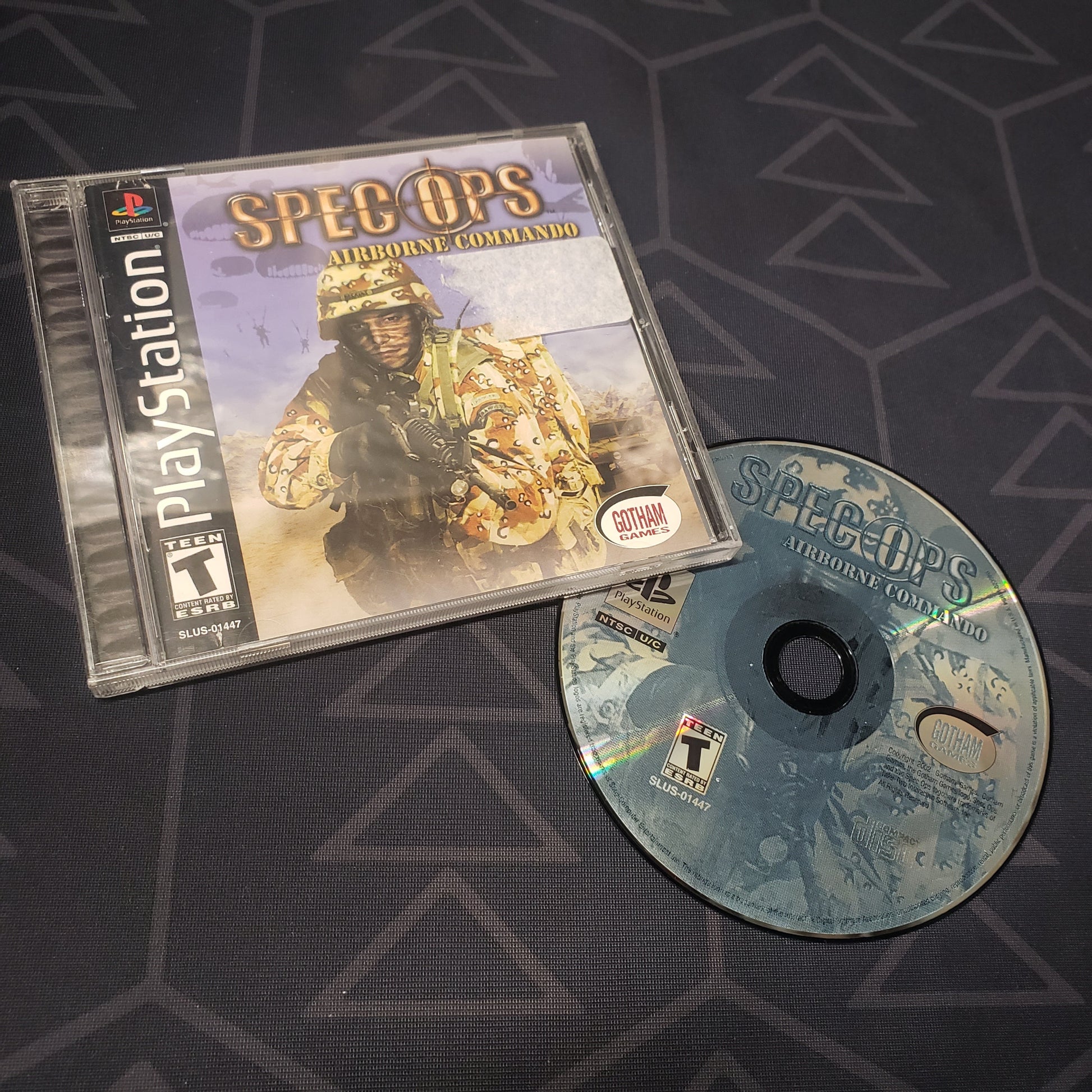 Image shows the jewel case with manual and disc for the video game Spec Ops: Airborne Commando for Playstation 1