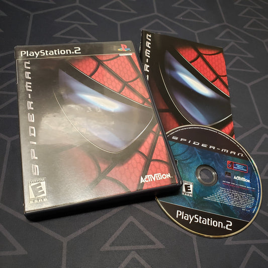 Image shows the case, manual and disc for the video game Spider-Man for Playstation 2