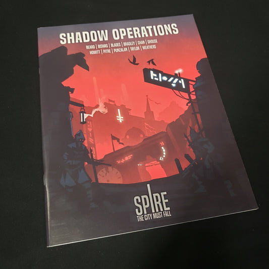 Image shows the front cover of the Shadow Operations book for the roleplaying game Spire: The City Must Fall