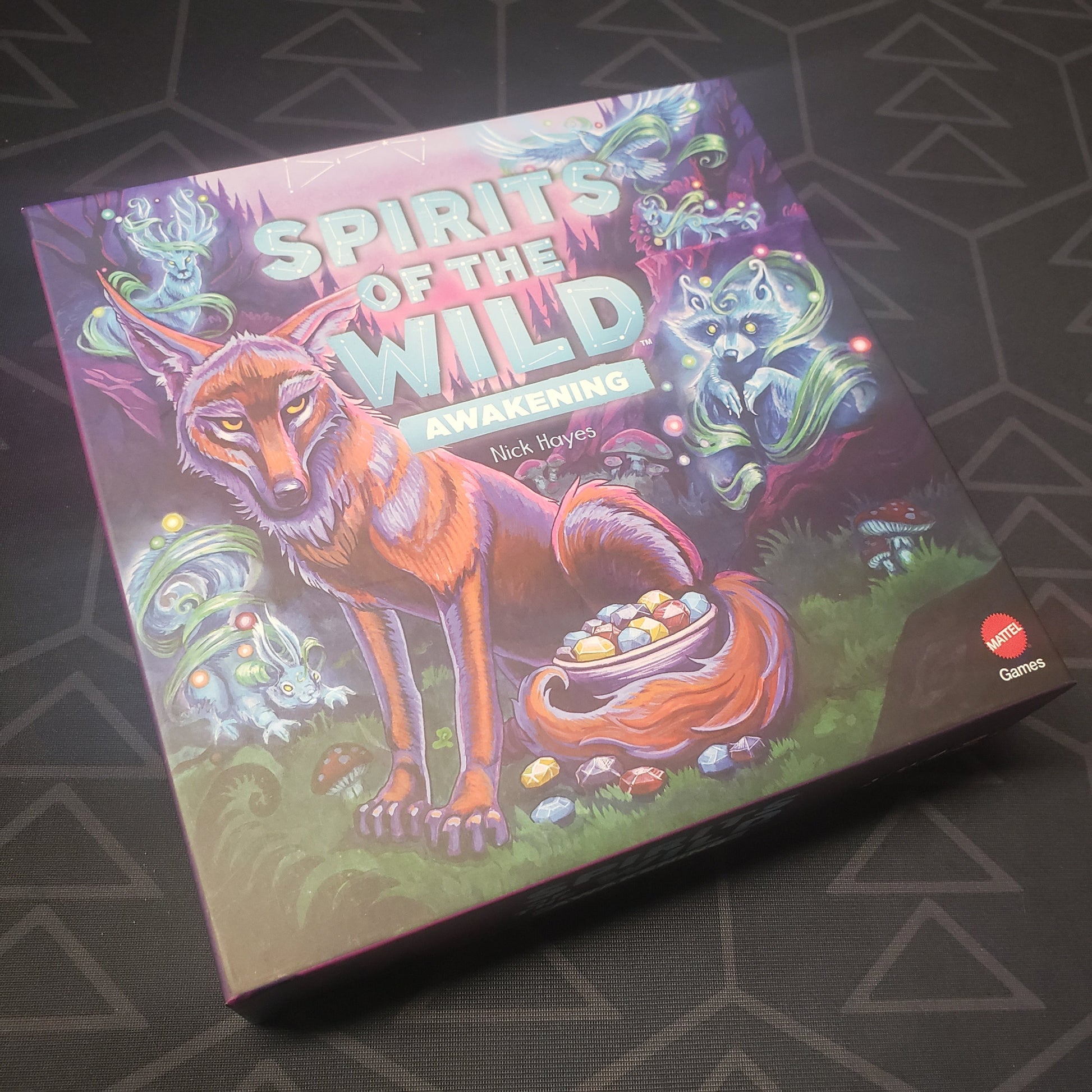 Image shows the front cover of the box for the Spirits of the Wild: Awakening board game