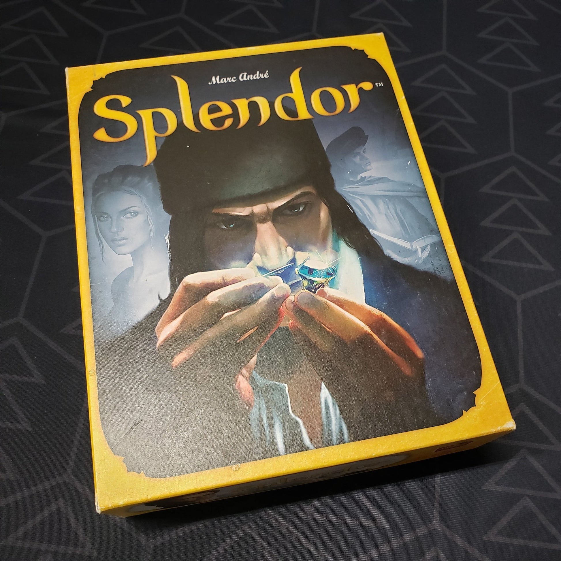 Image shows the front cover of the box of the Splendor board game