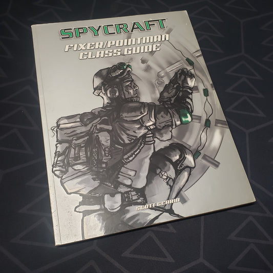 Image shows the front cover of the Fixer / Pointman Class Guide book for the roleplaying game Spycraft