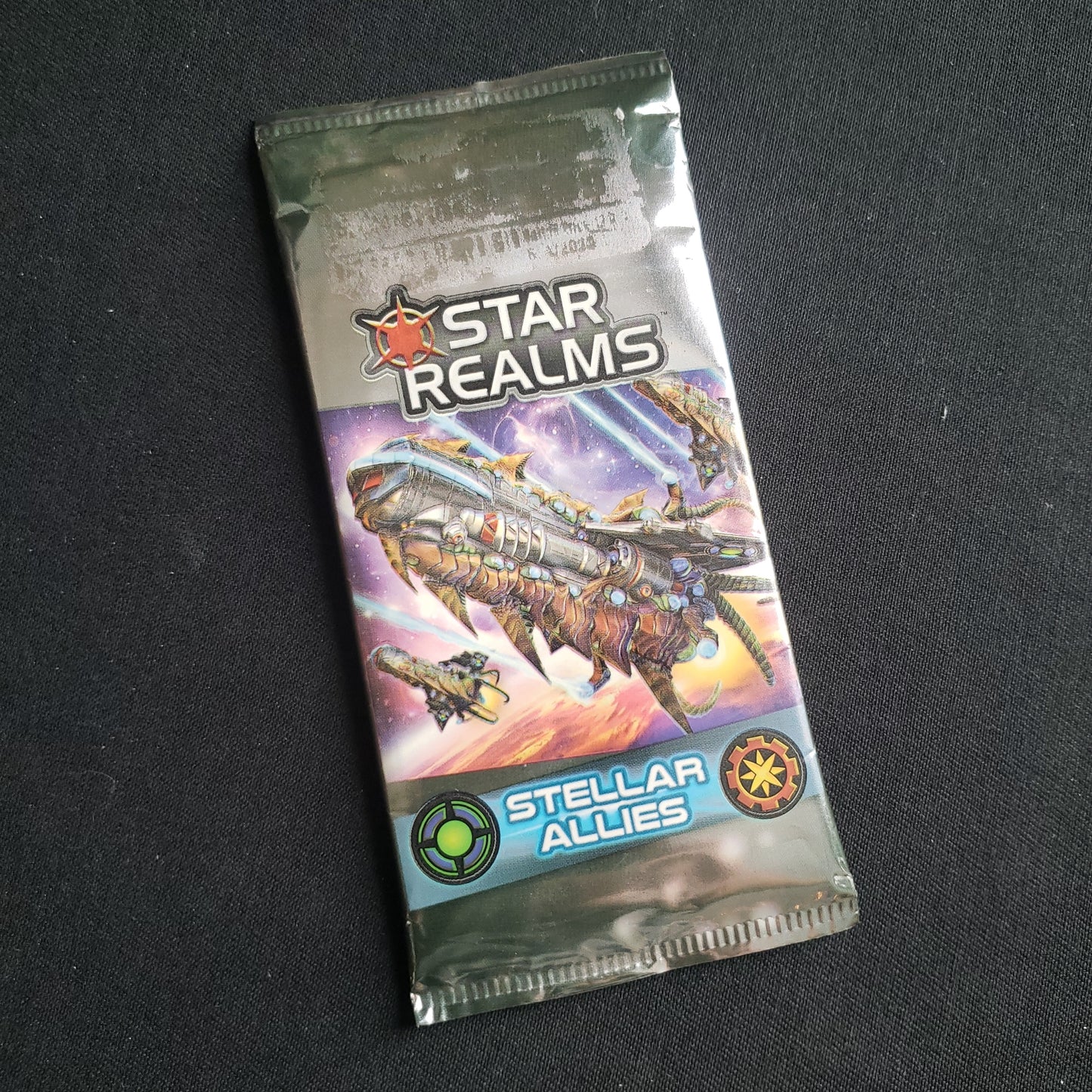 Image shows the front of the package for the Stellar Allies Expansion pack for the Star Realms card game