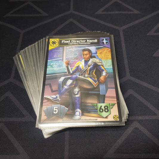 Image shows the cards for the Command Deck: The Alliance expansion for the card game Star Realms fanned out in a stack