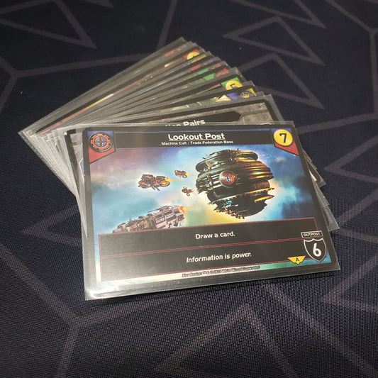Image shows the cards for the United: Assault expansion for the card game Star Realms fanned out in a stack
