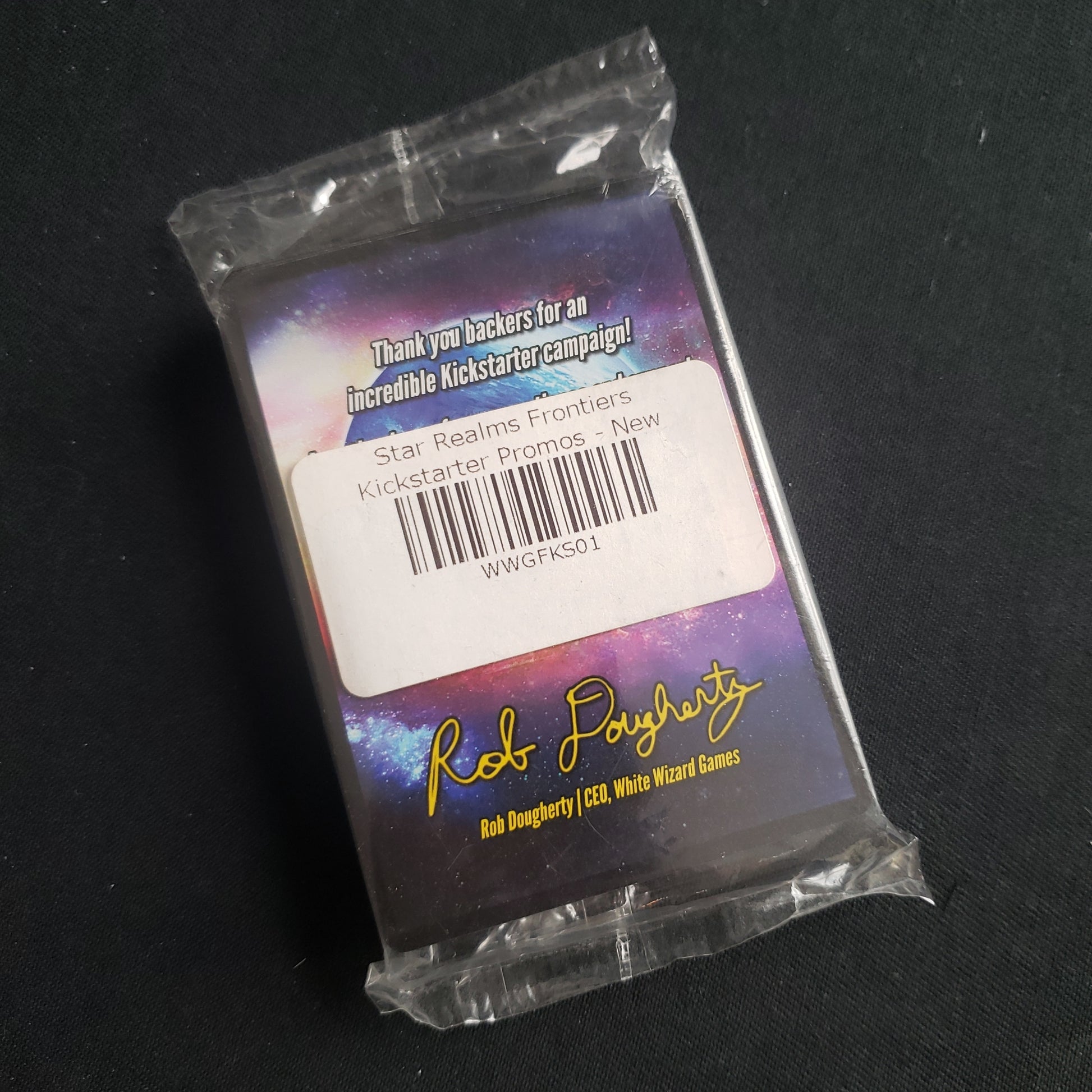 Image shows the front of the package for the Kickstarter Promo Pack for the Star Realms: Frontiers card game