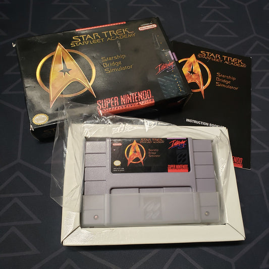 Image shows the box, manual & cartridge for the video game Star Trek: Starfleet Academy - Starship Bridge Simulator for the Super Nintendo