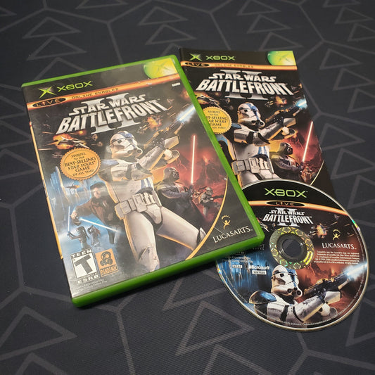 Image shows the case, manual and disc for the video game Star Wars Battlefront II for the original Xbox