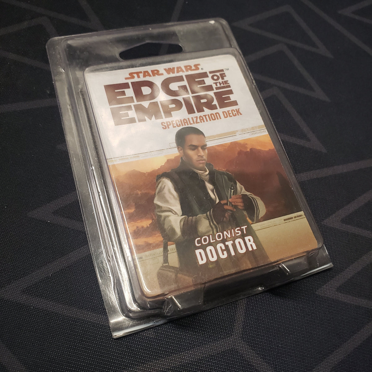 Image shows the front of the clamshell packaging for the Colonist Doctor Deck for the roleplaying game Star Wars: Edge of the Empire