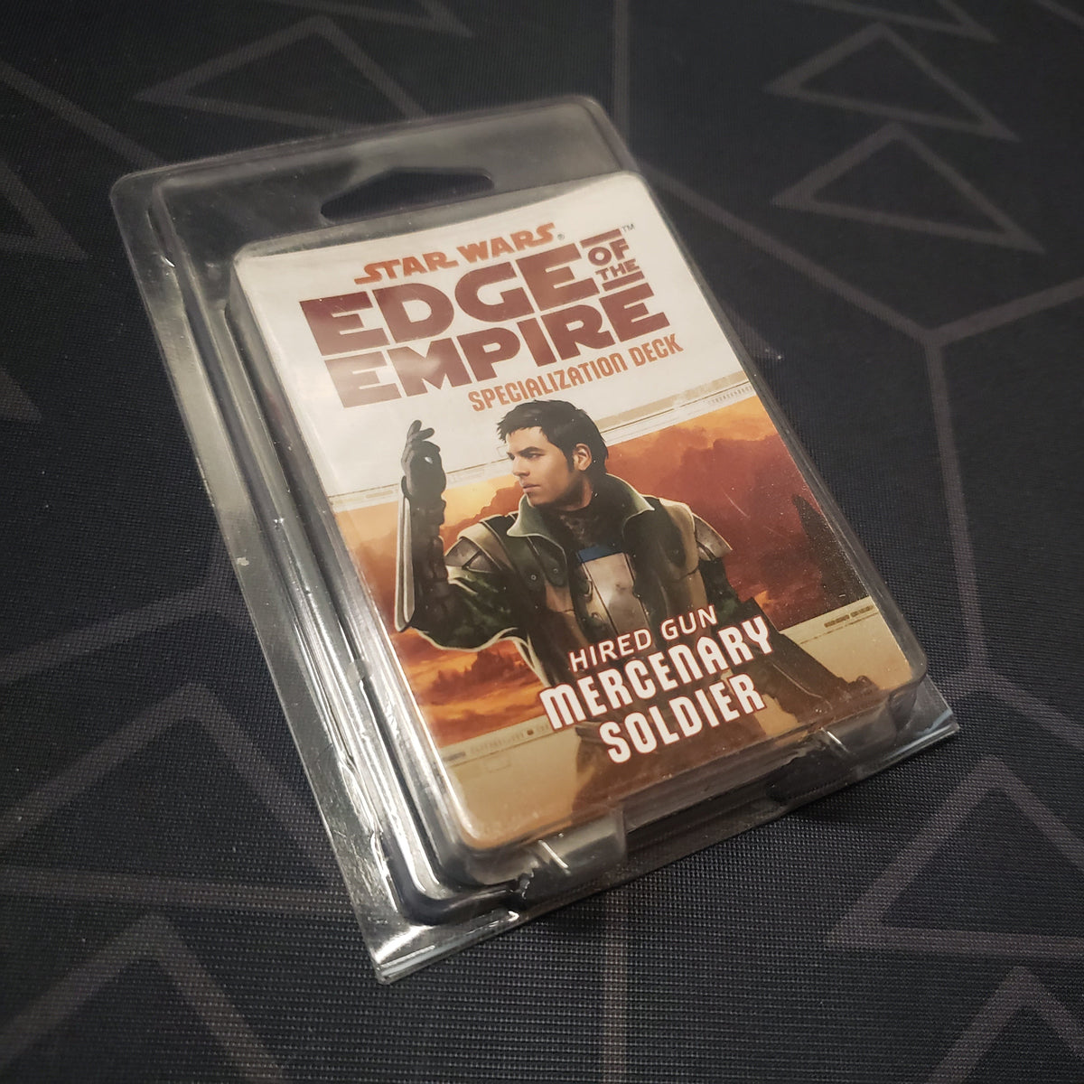 Image shows the front of the clamshell packaging for the Hired Gun Mercenary Soldier Deck for the roleplaying game Star Wars: Edge of the Empire