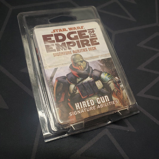 Image shows the front of the clamshell packaging for the Hired Gun Signature Abilities Deck for the roleplaying game Star Wars: Edge of the Empire