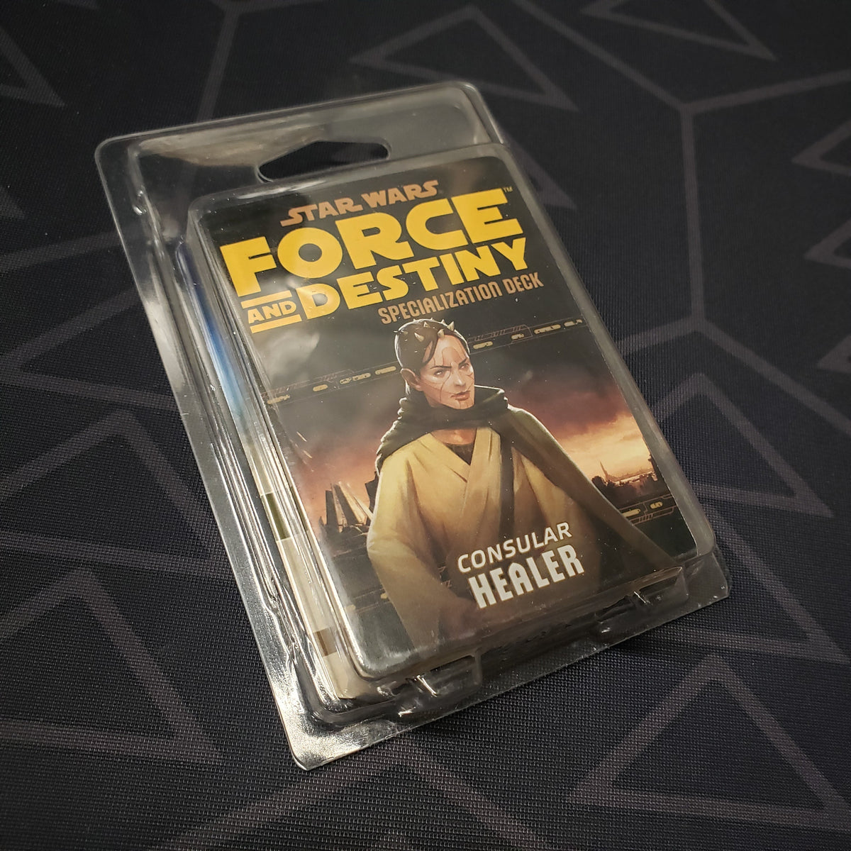 Image shows the front of the clamshell packaging for the Consular Healer Deck for the roleplaying game Star Wars: Force and Destiny