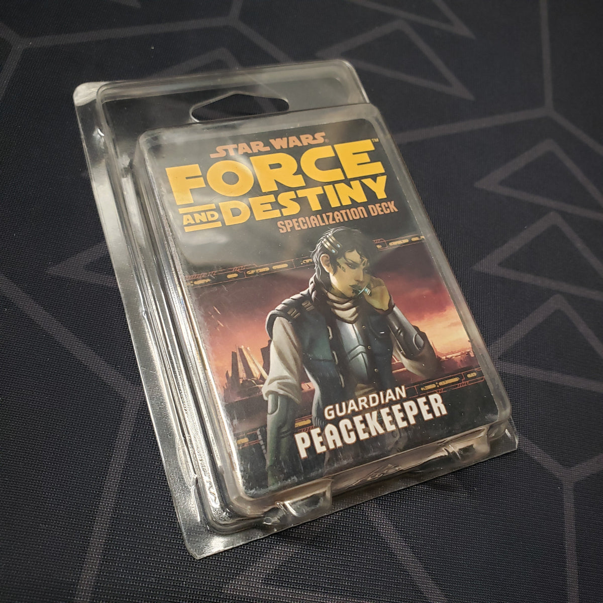 Image shows the front of the clamshell packaging for the Guardian Peacekeeper Deck for the roleplaying game Star Wars: Force and Destiny