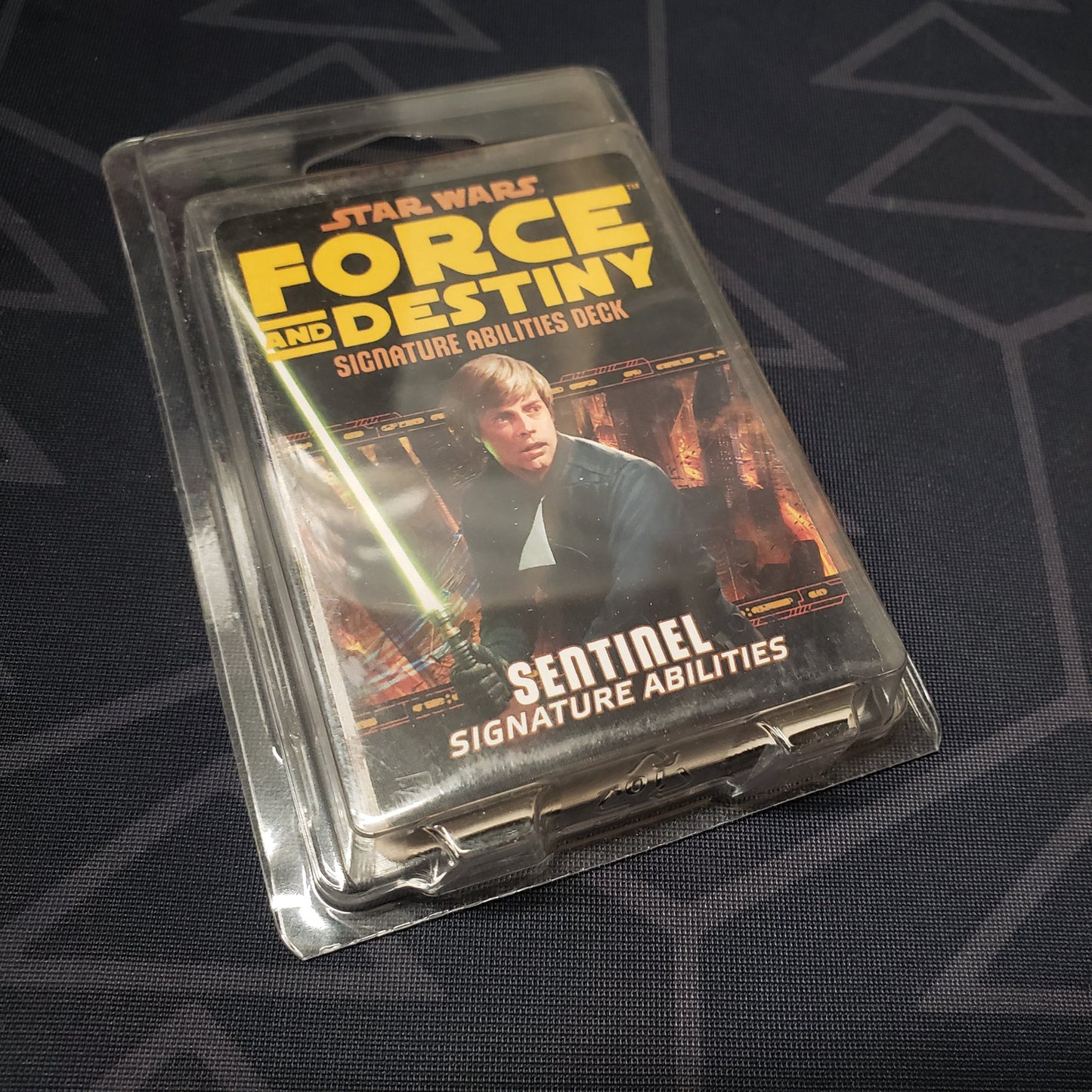 Image shows the front cover of the Sentinel Signature Abilities Deck box for the roleplaying game Star Wars: Force and Destiny