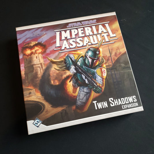 Image shows the front cover of the box of the Twin Shadows expansion for the board game Star Wars: Imperial Assault