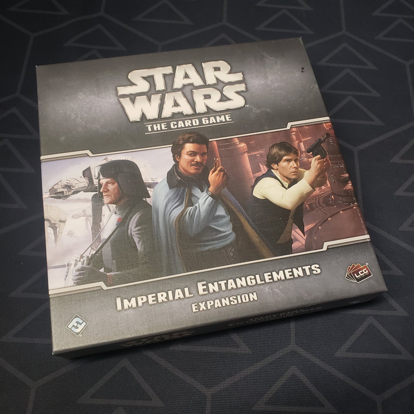 Image shows the front of the box of the Imperial Entanglements expansion for Star Wars: The Card Game