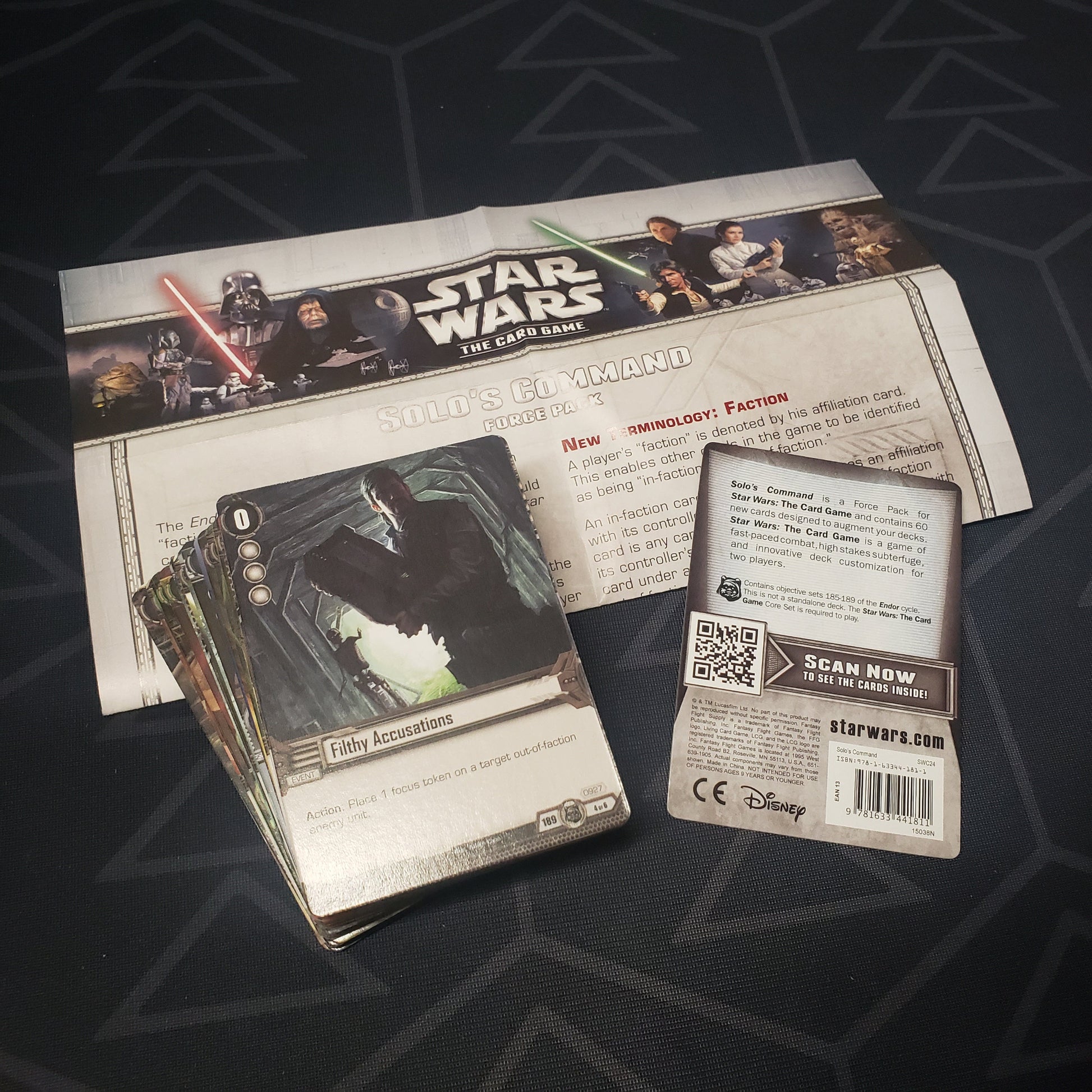 Image shows the fanned out cards & instructions of the Solo's Command Force pack for Star Wars: The Card Game