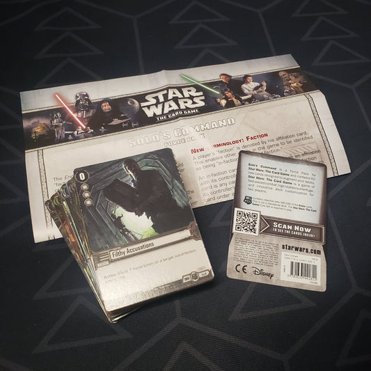 Image shows the fanned out cards & instructions of the Solo's Command Force pack for Star Wars: The Card Game