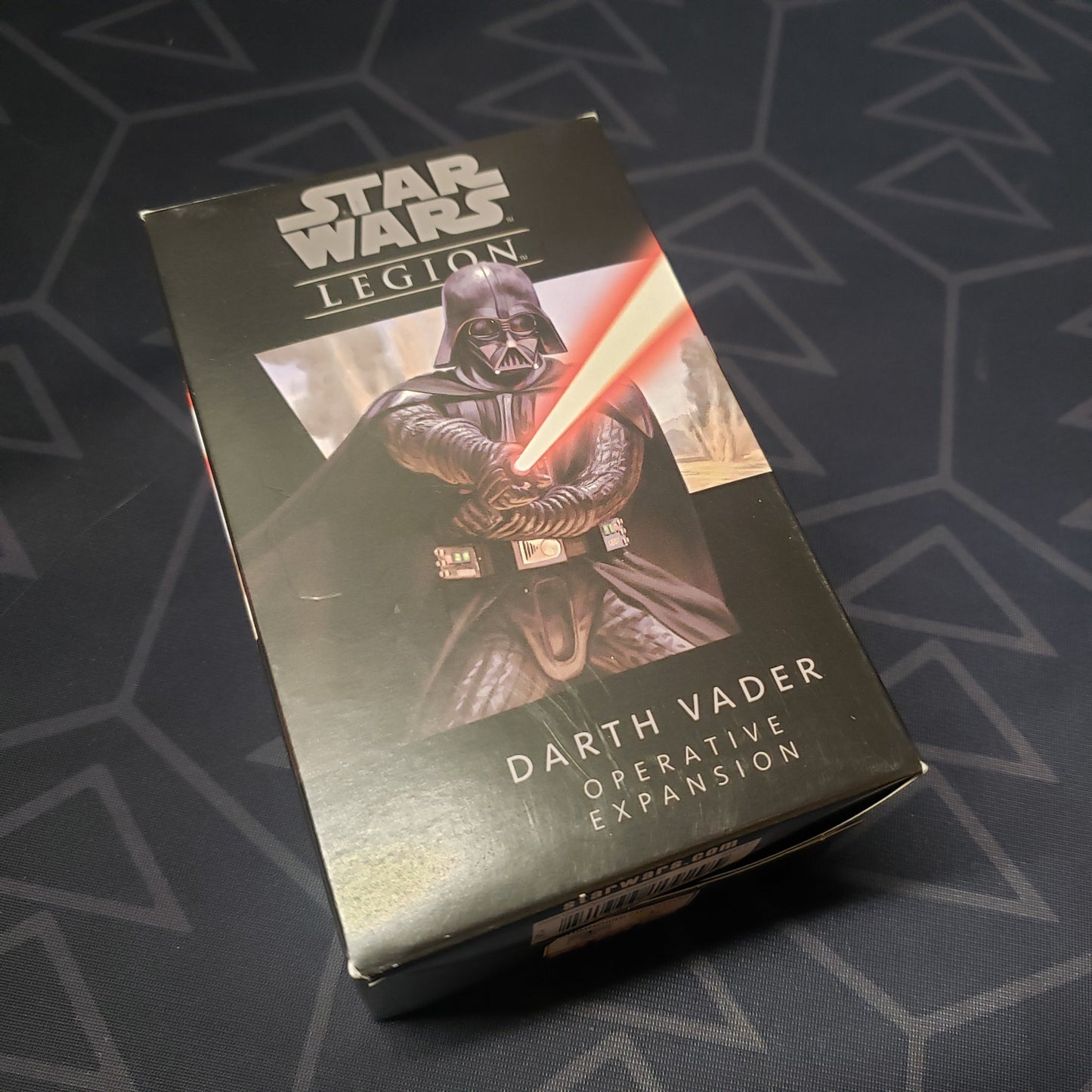 Image shows the front of the box for the Darth Vader Operative expansion for the miniatures game Star Wars Legion