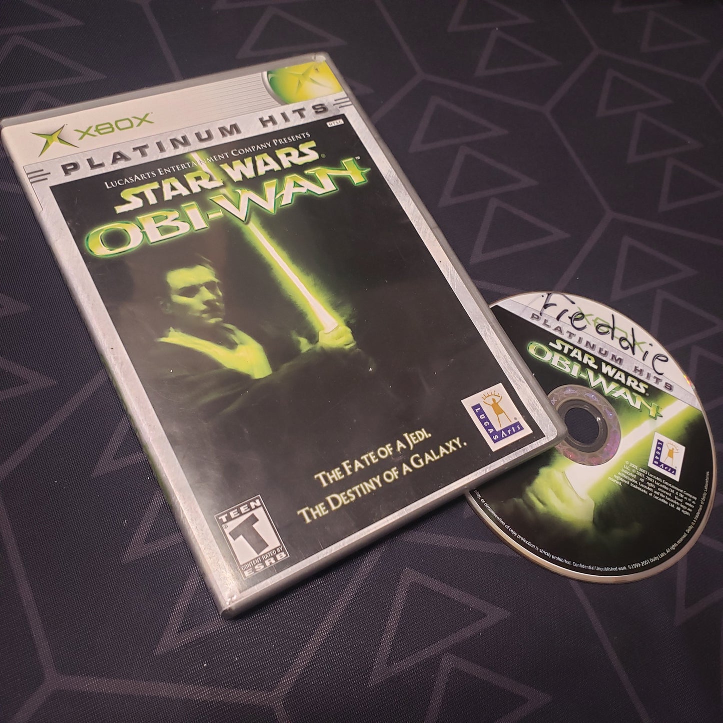 Image shows the case and disc for the video game Star Wars: Obi-Wan for the original Xbox