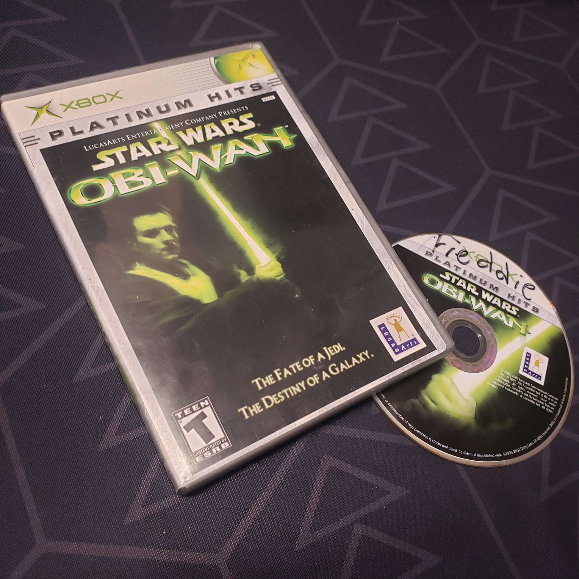 Image shows the case and disc for the video game Star Wars: Obi-Wan for the original Xbox