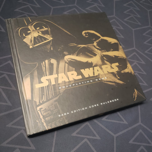 Image shows the front cover of the Saga Edition core rulebook for the Star Wars Roleplaying Game