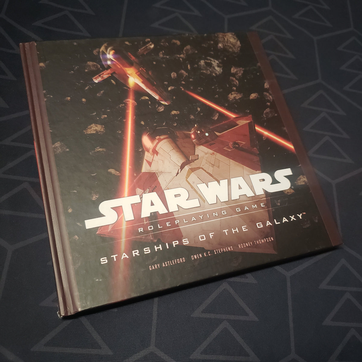 Image shows the front cover of the Starships of the Galaxy (Saga Edition) book for the Star Wars Roleplaying Game