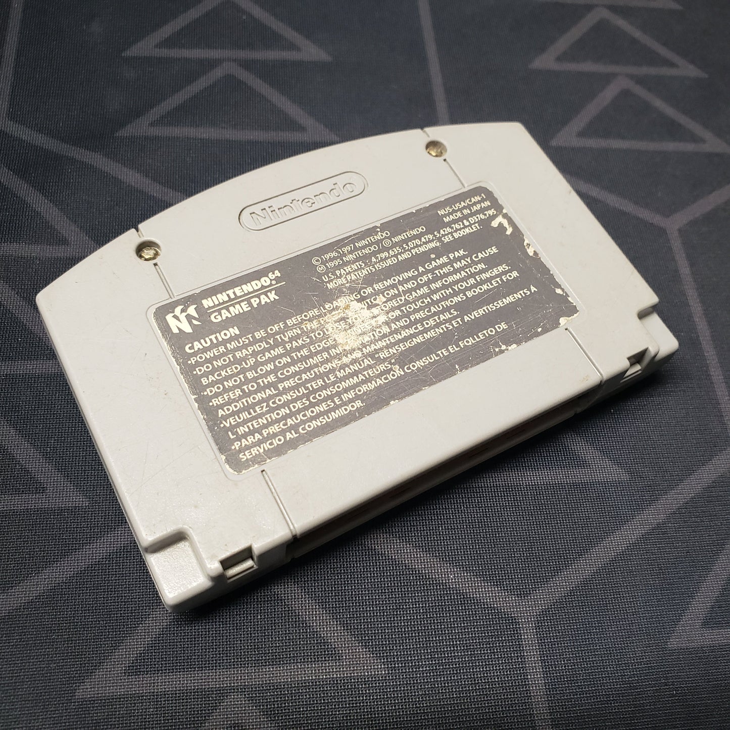 Image shows the back of the cartridge for the video game Star Wars: Shadows of the Empire for the Nintendo 64