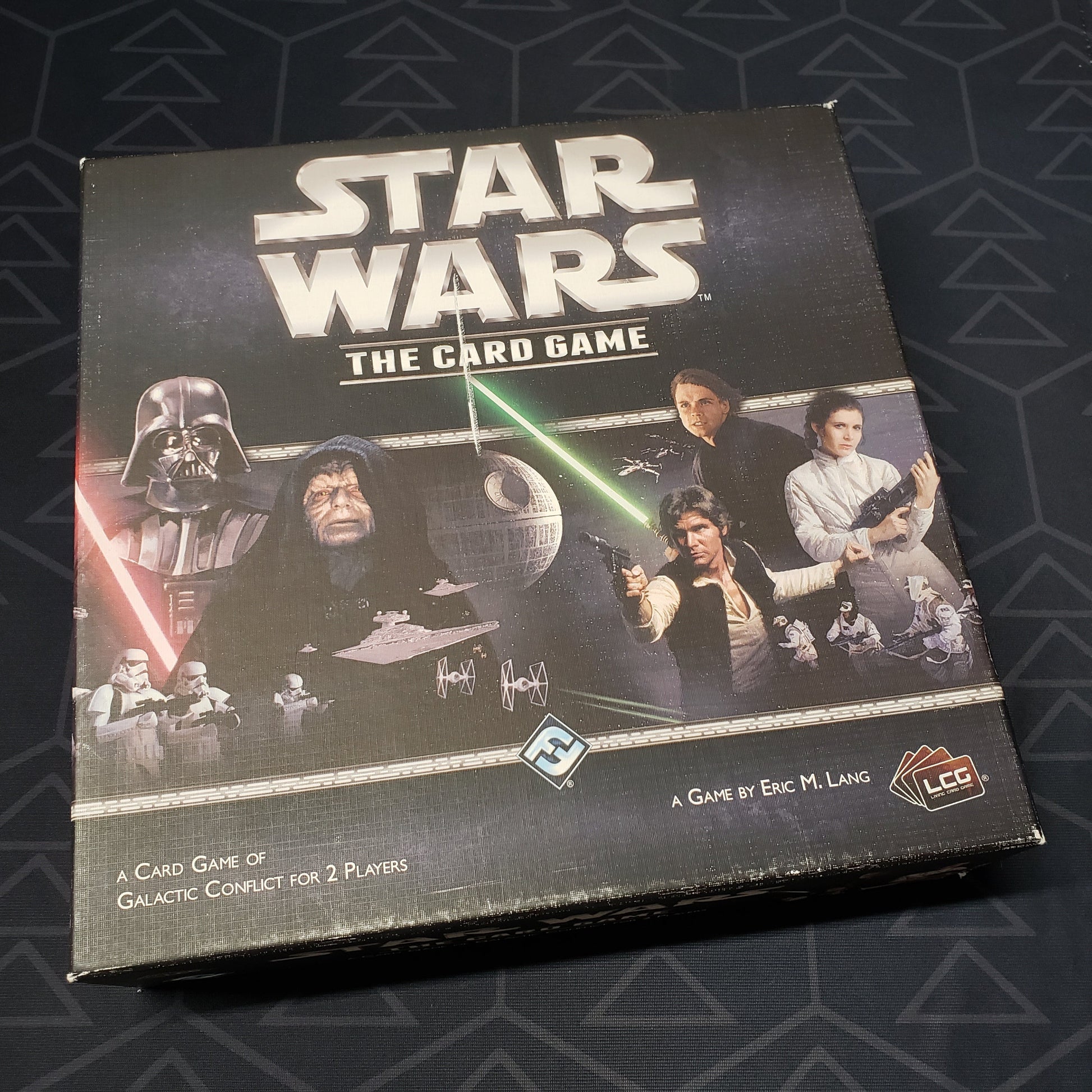 Image shows the front cover of the box of Star Wars: The Card Game
