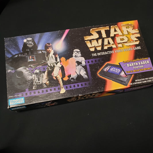 Image shows the front cover of the box for the Star Wars: The Interactive Video Board Game