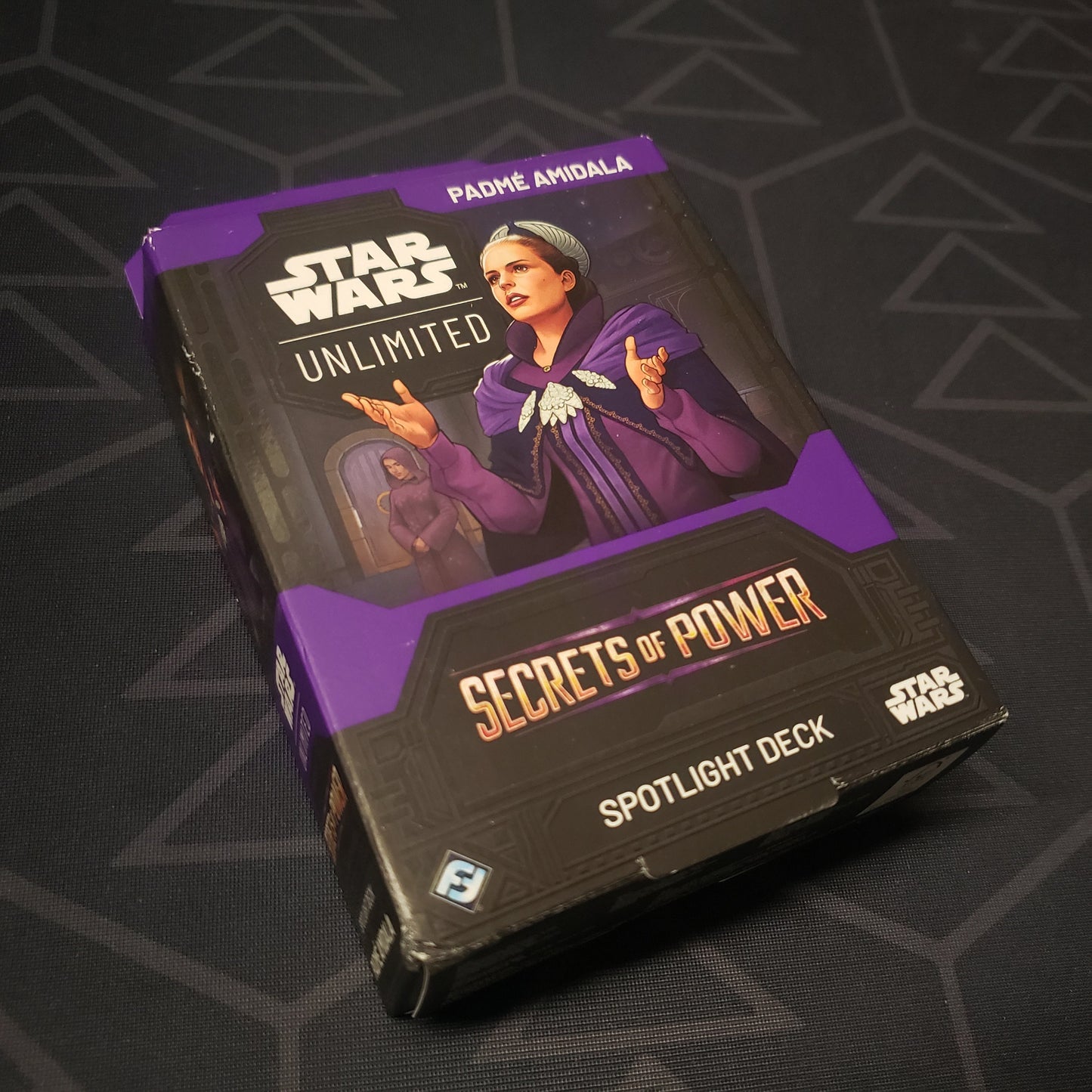 Image shows the front cover of the box of the Secrets of Power: Padme Amidala Spotlight Deck for the card game Star Wars Unlimited