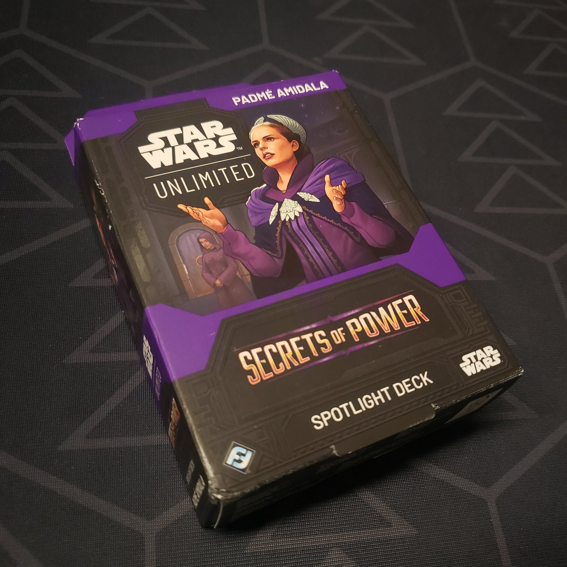 Image shows the front cover of the box of the Secrets of Power: Padme Amidala Spotlight Deck for the card game Star Wars Unlimited