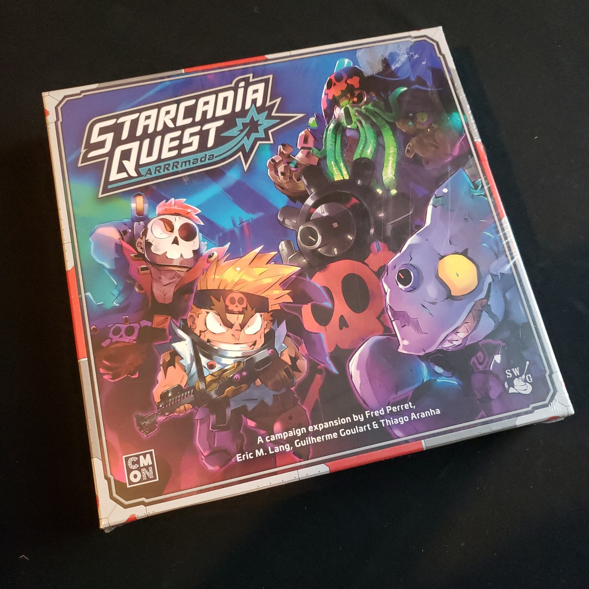 Image shows the front of the box for the ARRRmada Expansion for the Starcadia Quest board game