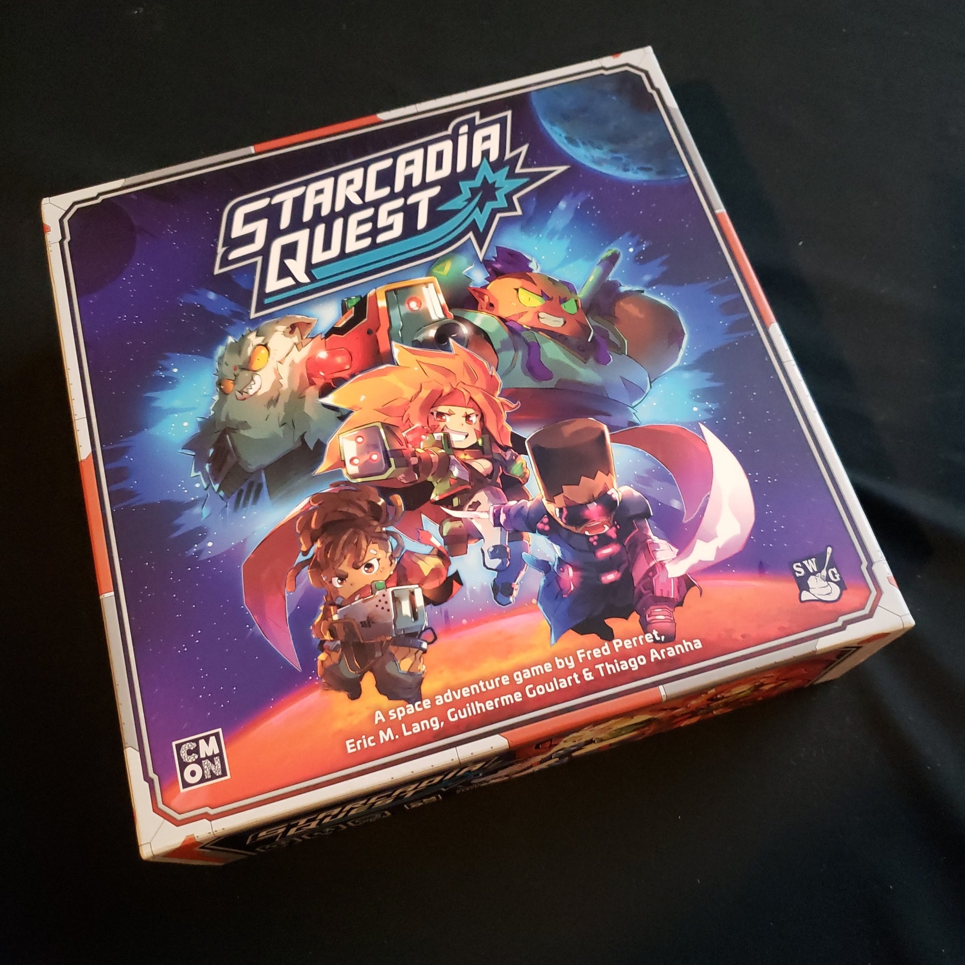 Image shows the front cover of the box of the Starcadia Quest board game