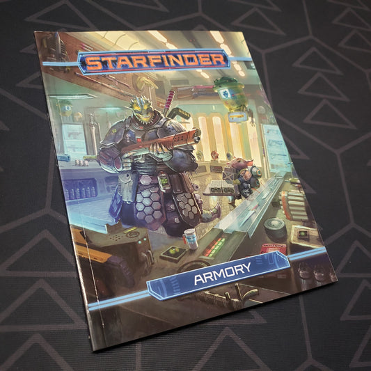 Image shows the front cover of the Armory (Pocket Edition) book for the roleplaying game Starfinder 1E