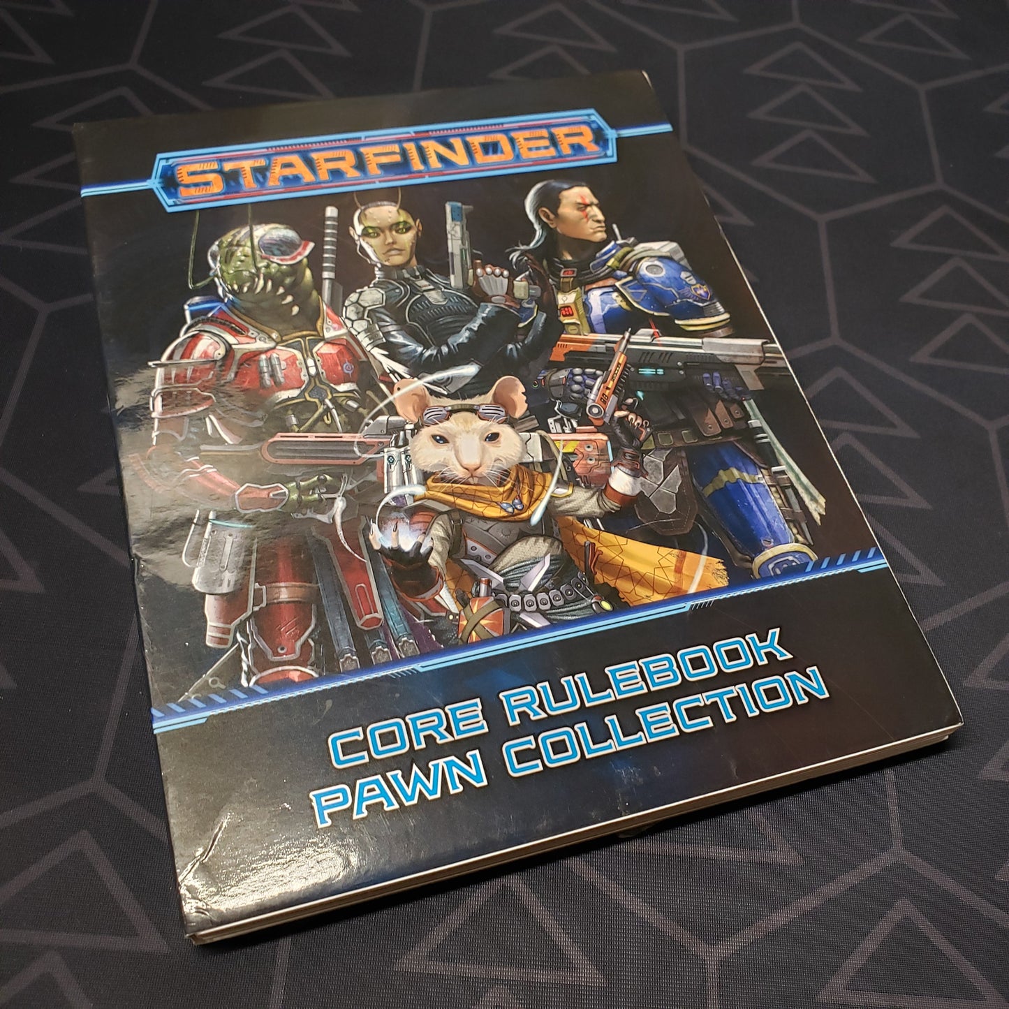 Image shows the front cover of the Core Rulebook Pawn Collection for the roleplaying game Starfinder 1E
