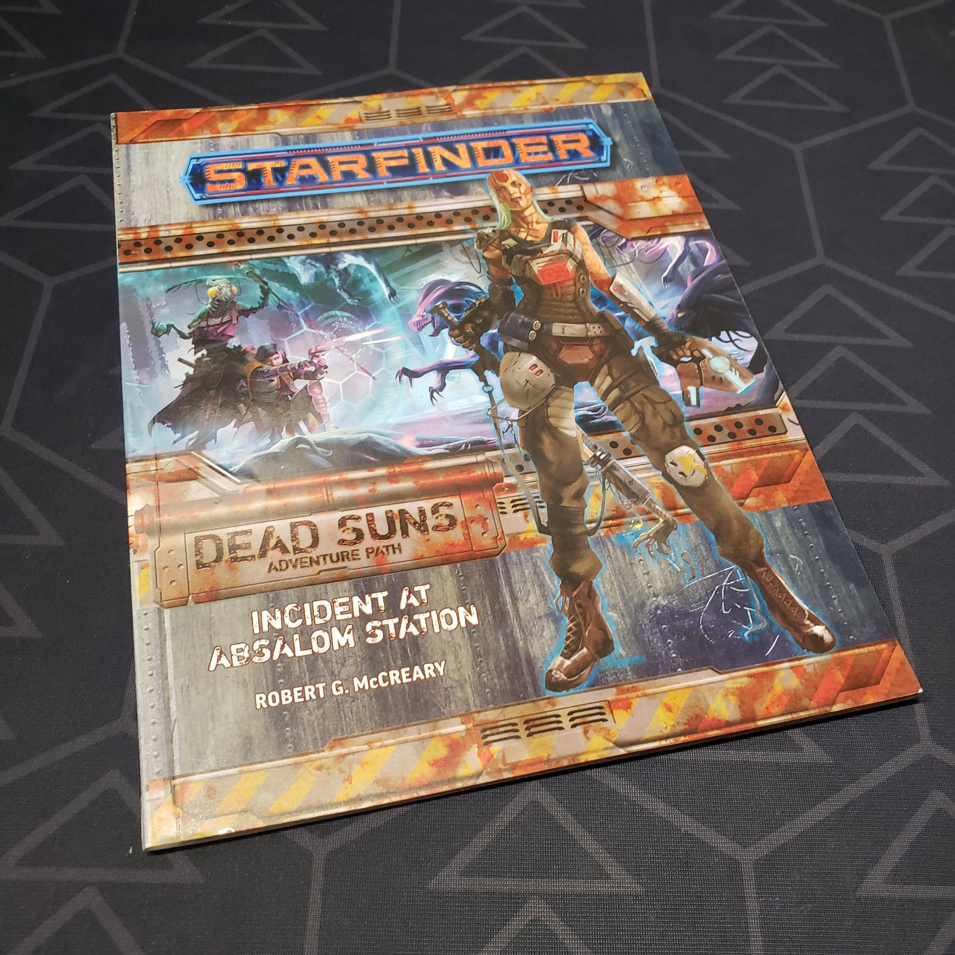 Image shows the front cover of the Dead Suns #1: Incident at Absalom Station book for the roleplaying game Starfinder 1E