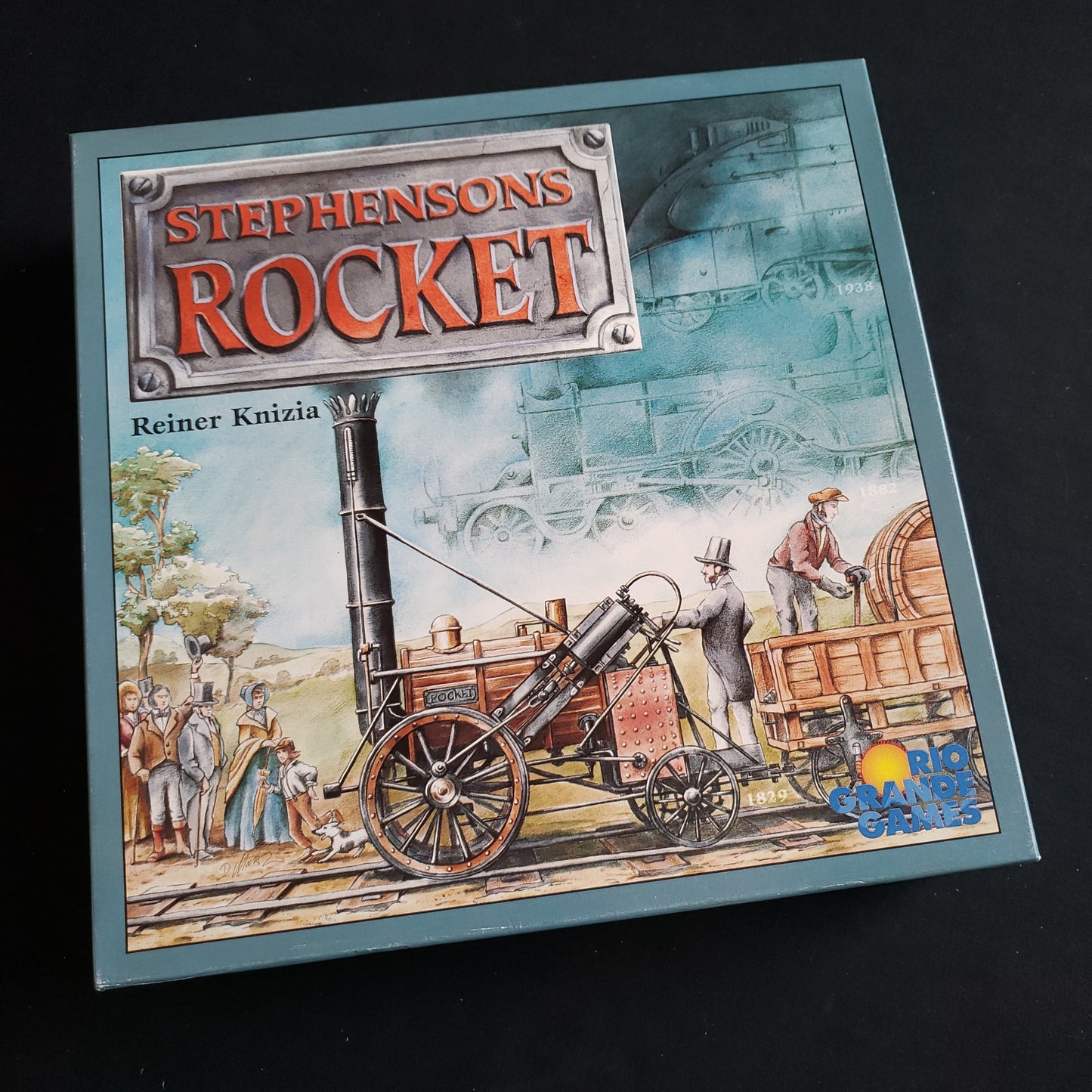 Image shows the front cover of the box of the Stephenson's Rocket board game