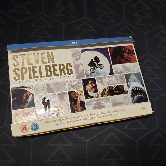 Image shows the front of the box for the movie set Steven Spielberg Director's Collection on Blu-Ray