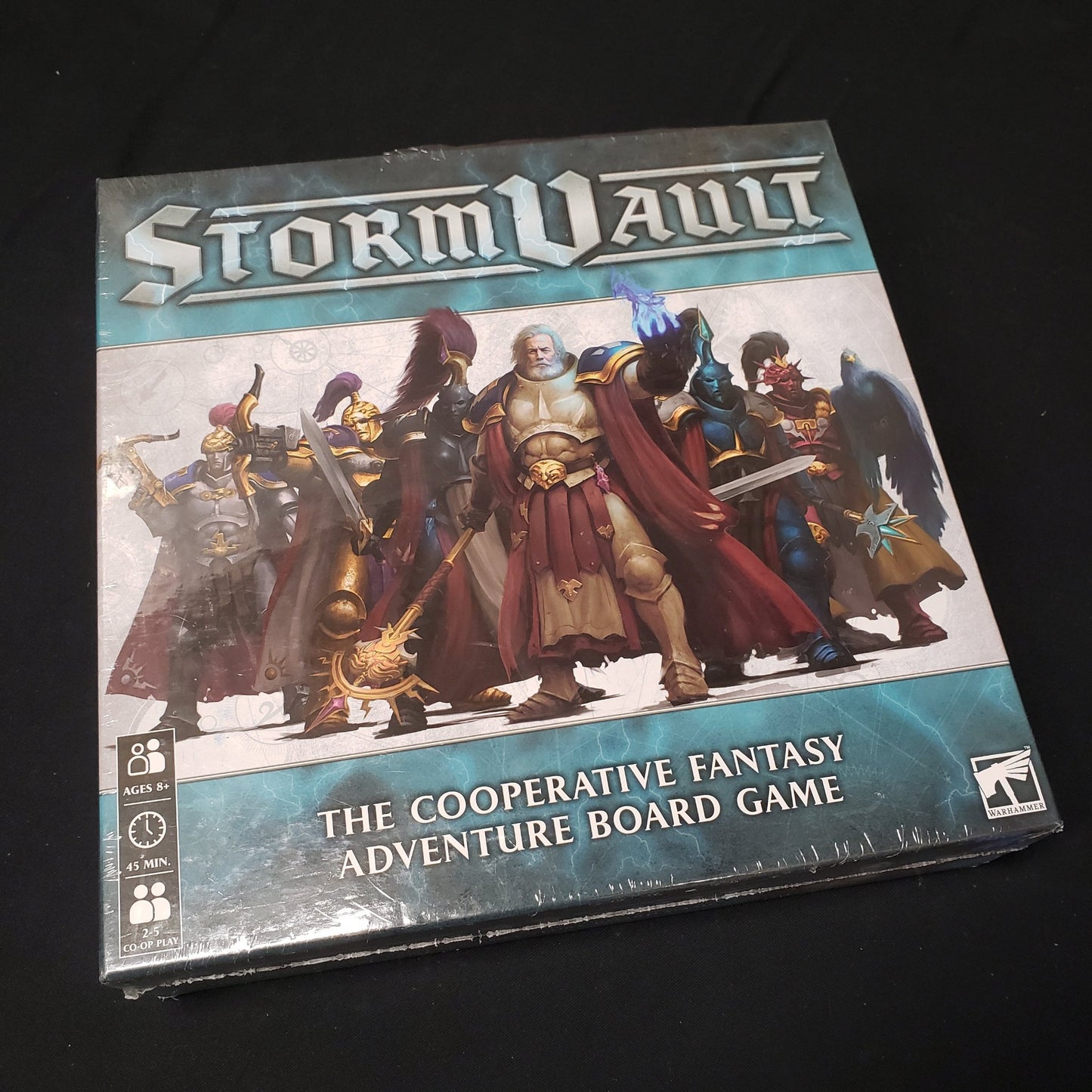 Image shows the front cover of the box of the Stormvault board game