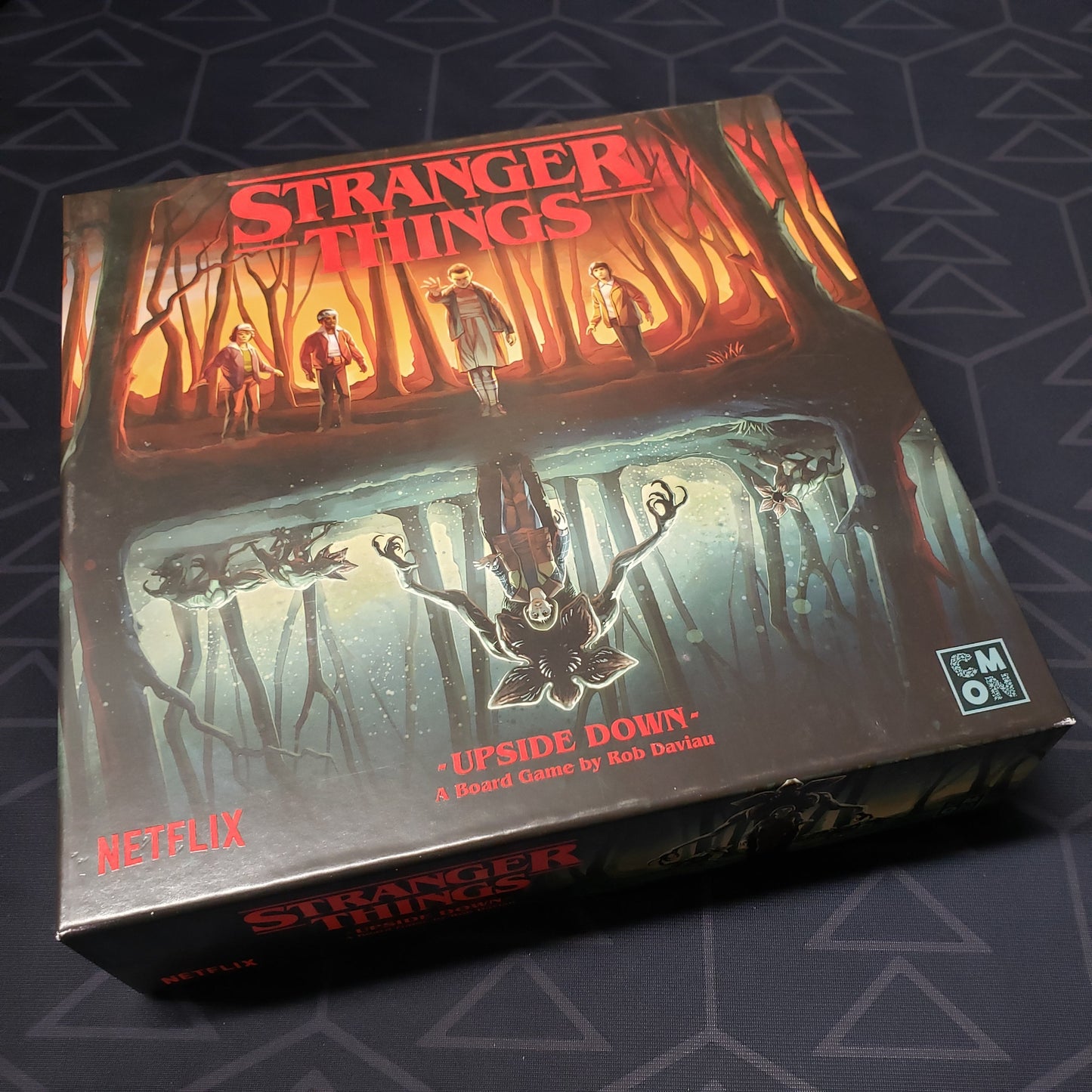 Image shows the front cover of the box for the Stranger Things: Upside Down board game